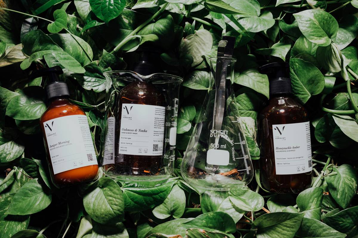Shelf display of non toxic skincare brands featuring glass bottles, minimalist labels, and plant-based ingredients